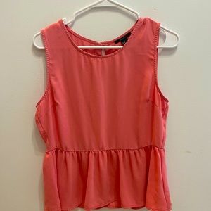 Peplum top with gold colored buttons down back